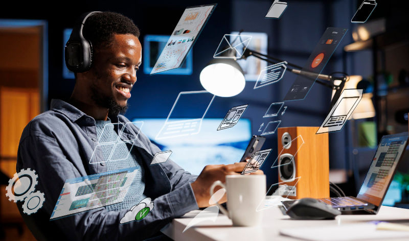 man using technology to improve business