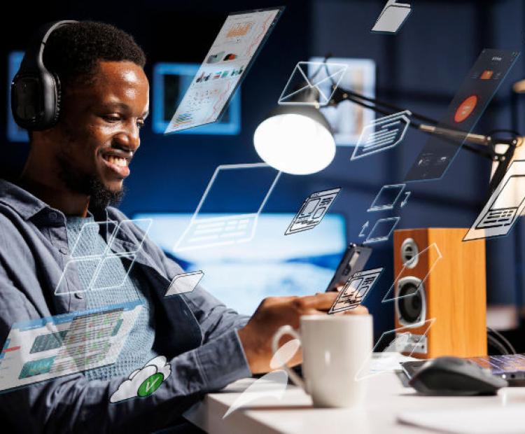 man using technology to improve business