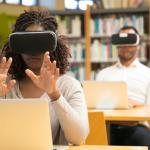 young lady learning with VR goggles 